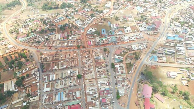 aerial drone view of rural community in kamatira, west pokot, kapenguria, Kenya.  road divides several blocks of houses in Kenya