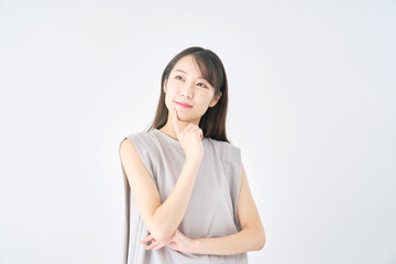 Fototapeta premium 女性 考える 白背景