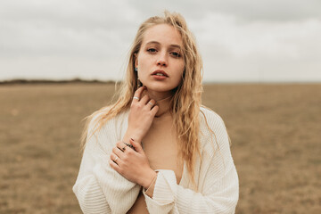 Woman standing on grassy field in countryside