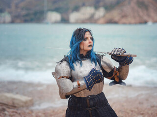 Medieval knight woman in armor prays, blessing before the battle.
