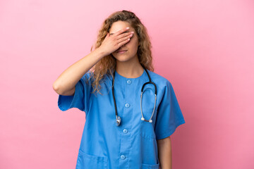 Young surgeon doctor woman isolated on pink background covering eyes by hands. Do not want to see something