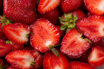 Fresh sliced strawberries for jam or pie filling, close-up, top view