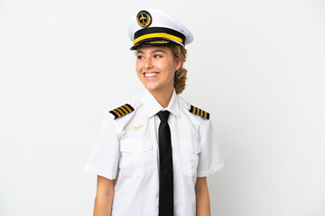Airplane blonde woman pilot isolated on white background looking side