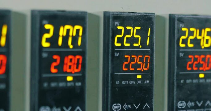 The digital panel displays production parameters. Factory control panel. Panel with indicators of production units