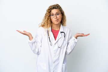 Young doctor blonde woman isolated on white background having doubts while raising hands