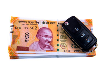 Success and got profit from business with new series of 200 indian rupee currency,money and calculator isolated on white background.