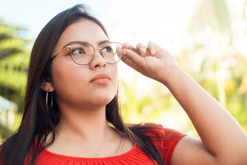 portrait of a woman wearing eyeglasses, Eye sight problems concept.