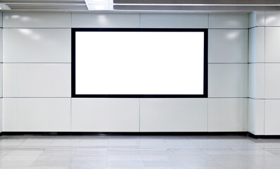 Blank billboard on the wall of underground hall