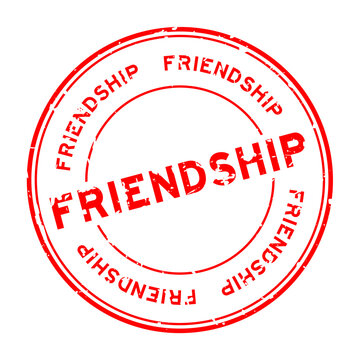 Grunge red friendship word round rubber seal stamp on white background