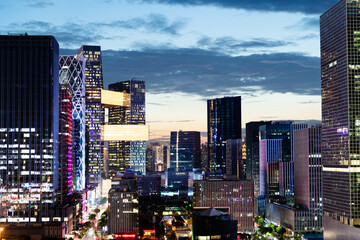Naklejka premium Office buildings in the city at dusk