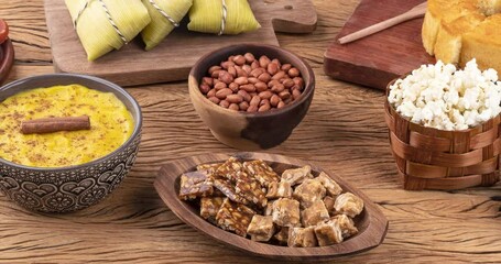 Typical brazilian june festival food over wooden table. Festa junina