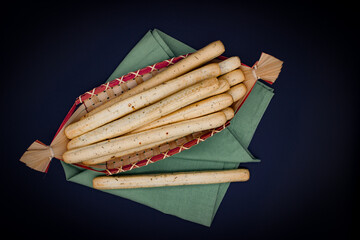Breadsticks on dark background