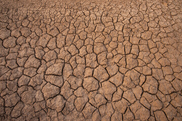 dry land in the dry season Drought, ground cracks, no hot water. Lack of humidity effect from global cracked soil in drought abstract nature background with cracked soil
