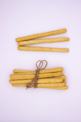 Breadsticks on light background