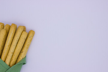 Breadsticks on light background