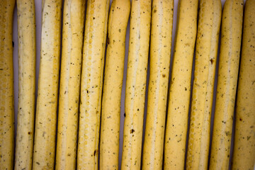 Breadsticks on light background