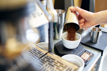 pouring coffee into a glass