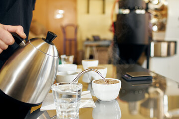 bartender pouring coffee