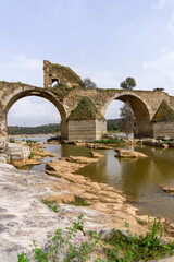 vertical view of the historic Ponte de Ajuda bridge over the Guadiana River