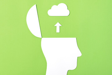 Uploading to Cloud Concept, Paper Cut out Open head with paper cut out Upload Arrow and Cloud. Uploading ones mind to the internet