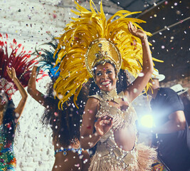 To having the time of our lives. Cropped shot of beautiful samba dancers performing in a carnival...