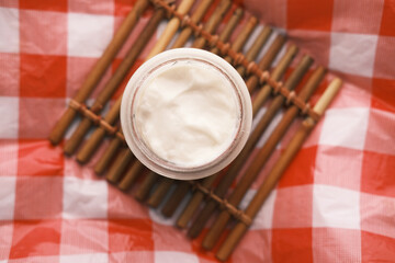 fresh yogurt in a bowl on table 