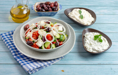 Greek salad with tzatziki, olives and feta cream. Traditional salad, meze,  with olive oil
