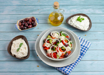 Greek salad with tzatziki, olives and feta cream. Traditional salad, meze,  with olive oil