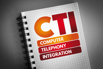 CTI - Computer Telephony Integration acronym on notepad, technology concept background