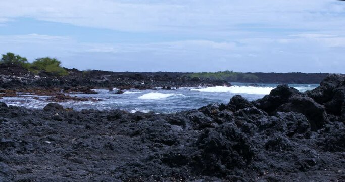 Waves Crashing Against Black Lava Rock, Maui, Hawaii