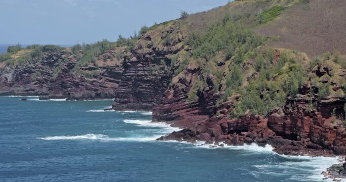 Water Crashing on Red Cliffs Maui Hawaii