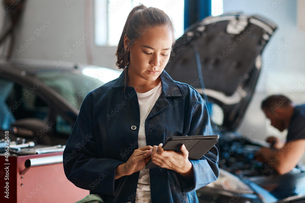 Aufkleber the more diverse your knowledge, the more customers you can help. shot of a female mechanic using a 