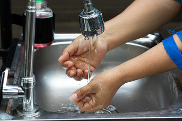 Wash hands with soapy water and running water to clean hands and maintain health.