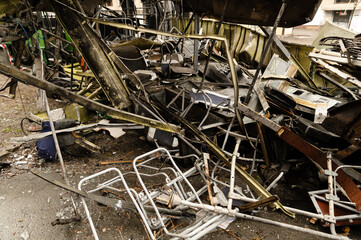 The trolleybus was destroyed on the street after Russian shelling. consequences of the war in Ukraine. broken transport.