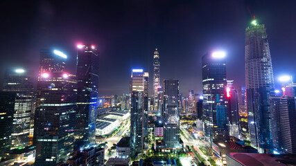 Fototapeta na wymiar Modern office buildings in the city at night