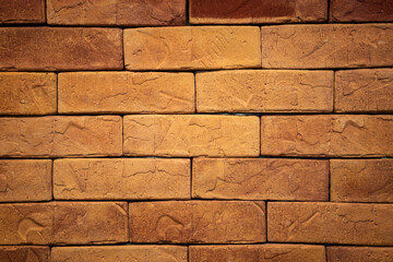 Brown clay brick block structure wall. Interior decoration and background textured photo.