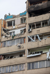 Fototapeta na wymiar War in Ukraine. Damaged residential building