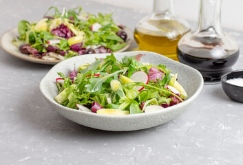 Green vegan salad from green leaves mix and vegetables. Top view