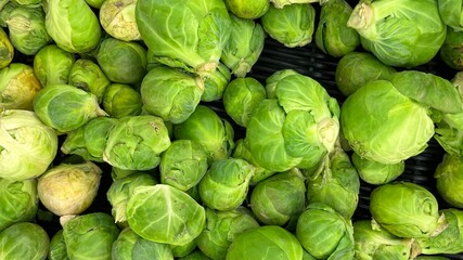 Brussels sprouts fresh green fruit a portion healthy meal food diet snack on the table copy space food background rustic top view keto or paleo diet veggie vegan or vegetarian food