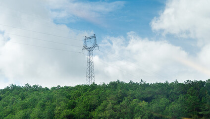 Fototapeta premium High electric tower on the mountain