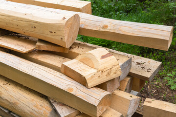 Wooden boards and logs, stacked wood for rural construction