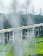 Viaduct bridge over green fields