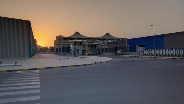 Sunset at free zone of Ajman timelapse. Ajman is the capital of the emirate of Ajman in the United Arab Emirates.