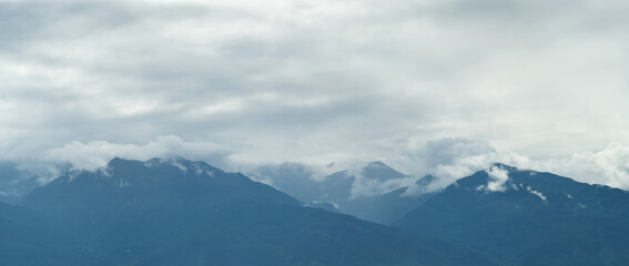 Obraz na płótnie Canvas Jade Dragon Snow Mountain covered with fog