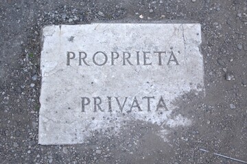 Photo of a stone depicting a private property, Verona, Italy - obrazy, fototapety, plakaty