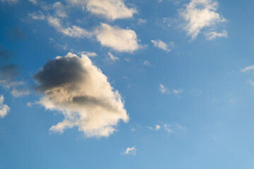 Blue sky with gray clouds