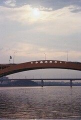 Fototapeta na wymiar bridge over the river at sunset / Korea Han-river / film photography
