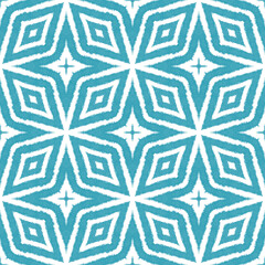 Ikat repeating swimwear design. Turquoise