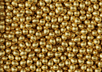 Chocolate easter eggs with gold foil. Wallpaper. backdrop.	
