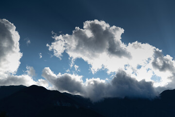 Gray clouds and mountain silhouette